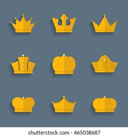 Gold crown set in flat style with shadow isolated on a background