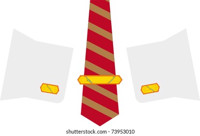 Gold cuff links and a tie-pin, decorations