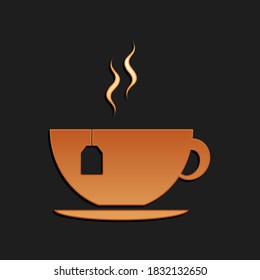 Gold Cup with tea bag icon isolated on black background. Long shadow style. Vector.