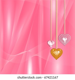Gold and diamond valentine hearts on a pink silk material background