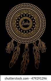 Gold dreamcatcher with feathers. Boho chic style.
