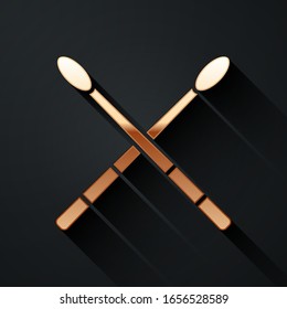 Gold Drum sticks icon isolated on black background. Musical instrument. Long shadow style. Vector Illustration
