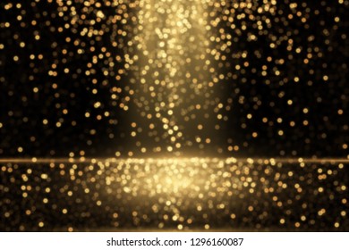 Gold dust effect. Defocused glitters. Glowing golden particles. Abstract sparkling background.