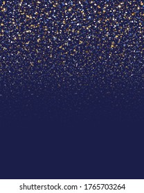 Gold dust on blue background. Falling bright sparkling particles. Gold glitter confetti. Falling sparkles. Golden light effect. Bokeh lights. Vertical design wedding greeting. Sparkling backdrop 
