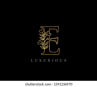 Gold E Letter Logo Icon . Initial Letter E Design Vector Luxury Gold Color.Print monogram initials stamp line art sign symbol