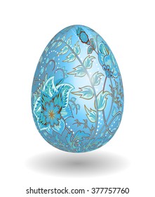 Gold egg with hand drawn floral ornaments isolated on white background. Fantasy blue gray flowers on blue egg.