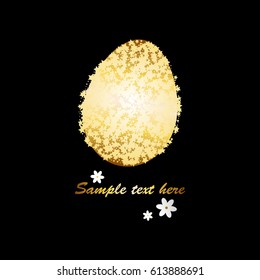 Gold egg on a black background. Happy Easter!