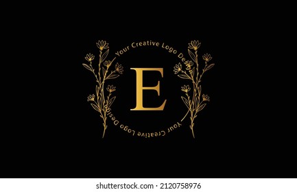 Gold Elegant letter E. Graceful style. Calligraphic beautiful logo. Vintage drawn emblem for book design, brand name, business card, Restaurant, Boutique, Hotel. Vector illustration