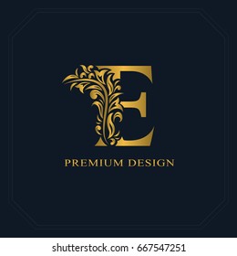 Gold Elegant letter E. Graceful style. Calligraphic beautiful logo. Vintage drawn emblem for book design, brand name, business card, Restaurant, Boutique, Hotel. Vector illustration