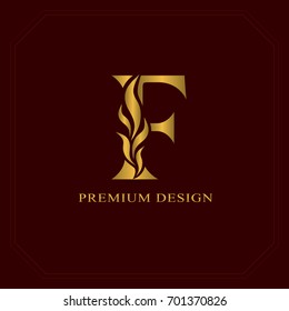 Gold Elegant letter F. Graceful style. Calligraphic beautiful logo. Vintage drawn emblem for book design, brand name, business card, Restaurant, Boutique, Hotel. Vector illustration