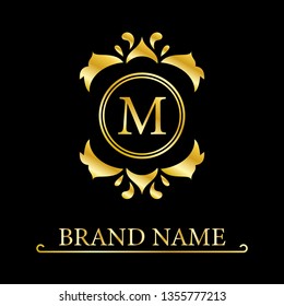 Gold Elegant letter M. Graceful style. Calligraphic beautiful logo. Vintage drawn emblem for book design, brand name, business card, Restaurant, Boutique, Hotel. Vector illustration