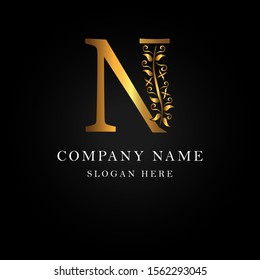 Gold Elegant letter N. Graceful style. Calligraphic beautiful logo. Vintage drawn emblem for book design, brand name, business card, Restaurant, Boutique, Hotel. Vector illustration