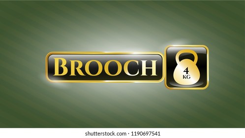  Gold emblem or badge with 4kg kettlebell icon and Brooch text inside