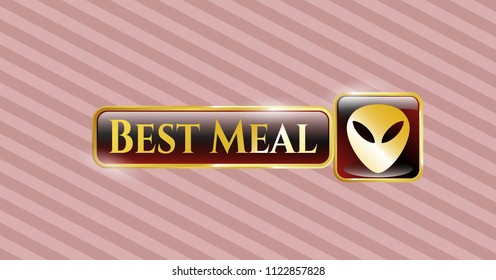  Gold emblem or badge with alien icon and Best Meal text inside