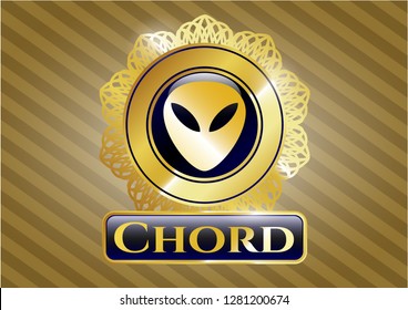  Gold emblem or badge with alien icon and Chord text inside