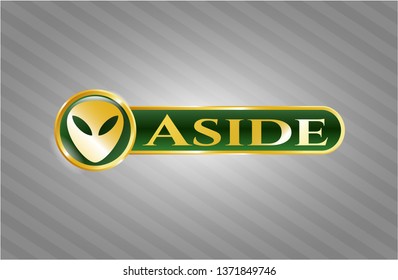  Gold emblem or badge with alien icon and Aside text inside