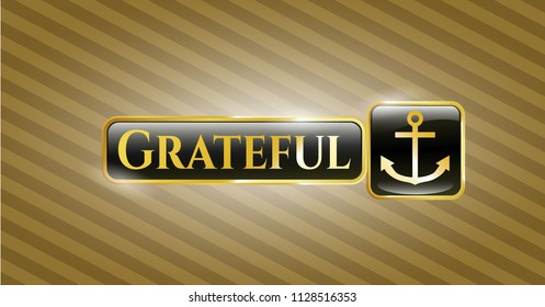  Gold emblem or badge with anchor icon and Grateful text inside