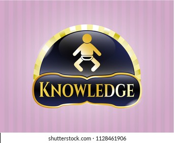  Gold emblem or badge with baby icon and Knowledge text inside