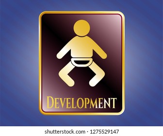  Gold emblem or badge with baby icon and Development text inside