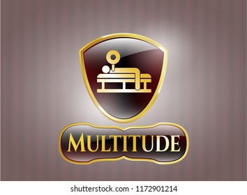  Gold emblem or badge with bench press icon and Multitude text inside