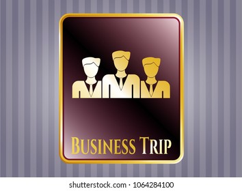  Gold emblem or badge with business teamwork icon and Business Trip text inside