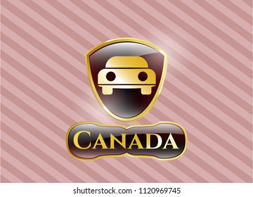  Gold emblem or badge with car seen from front icon and Canada text inside