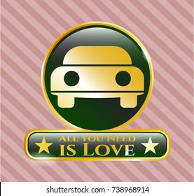  Gold emblem or badge with car seen from front icon and All you Need is Love text inside