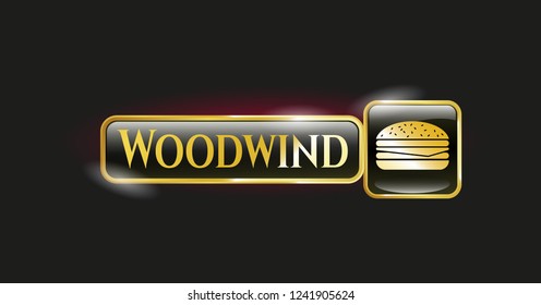  Gold emblem or badge with cheeseburger icon and Woodwind text inside
