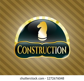  Gold emblem or badge with chess knight icon and Construction text inside
