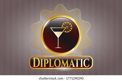 Gold emblem or badge with cocktail glass icon and Diplomatic text inside