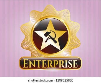  Gold emblem or badge with communism icon and Enterprise text inside