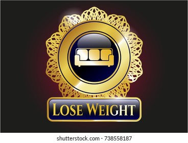  Gold emblem or badge with couch icon and Lose Weight text inside