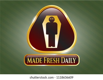  Gold emblem or badge with dead man in his coffin icon and Made Fresh Daily text inside