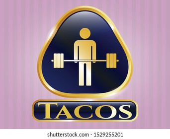  Gold emblem or badge with deadlift icon and Tacos text inside