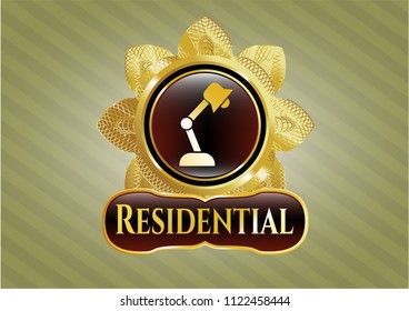  Gold emblem or badge with desk lamp icon and Residential text inside