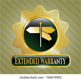  Gold emblem or badge with directions sign icon and Extended Warranty text inside