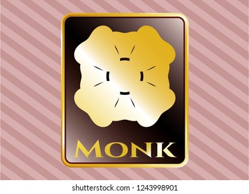  Gold emblem or badge with four leaf clover icon and Monk text inside