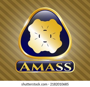 Gold emblem or badge with four leaf clover icon and Amass text inside