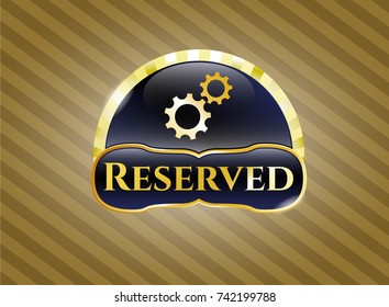  Gold emblem or badge with gear, team work icon and Reserved text inside