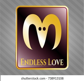  Gold emblem or badge with goat head icon and Endless Love text inside