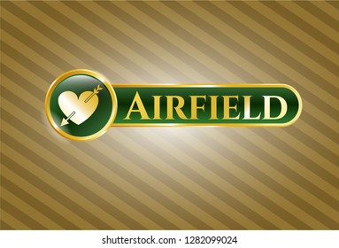 Gold emblem or badge with heart with arrow icon and Airfield text inside