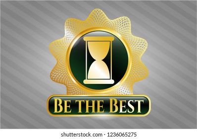  Gold emblem or badge with hourglass icon and Be the Best text inside