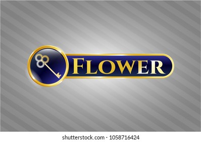  Gold emblem or badge with key icon and Flower text inside