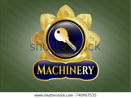  Gold emblem or badge with key icon and Machinery text inside