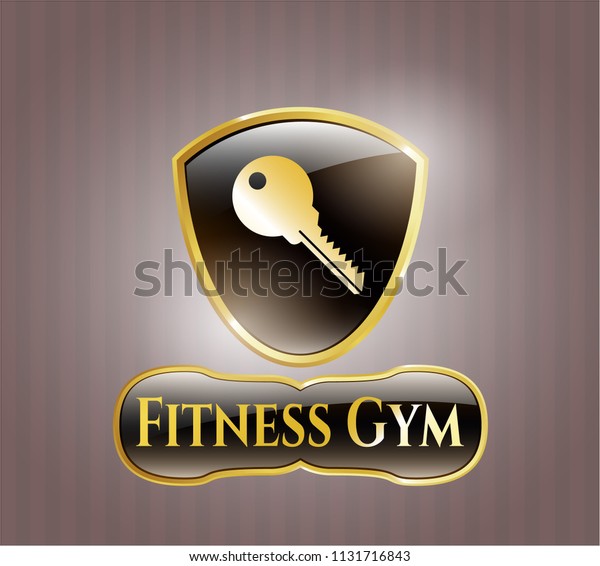  Gold emblem or badge with key icon and Fitness\
Gym text inside