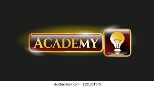  Gold emblem or badge with light bulb icon and Academy text inside