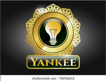  Gold emblem or badge with light bulb icon and Yankee text inside