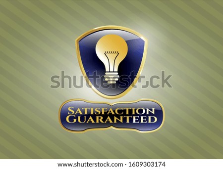  Gold emblem or badge with light bulb icon and Satisfaction Guaranteed text inside