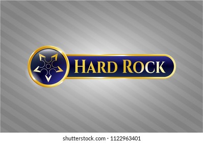  Gold emblem or badge with ninja star icon and Hard Rock text inside