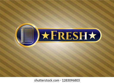  Gold emblem or badge with note book icon and Fresh text inside